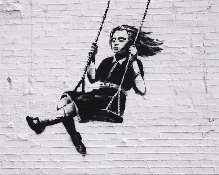 Girl on Swing by Banksy